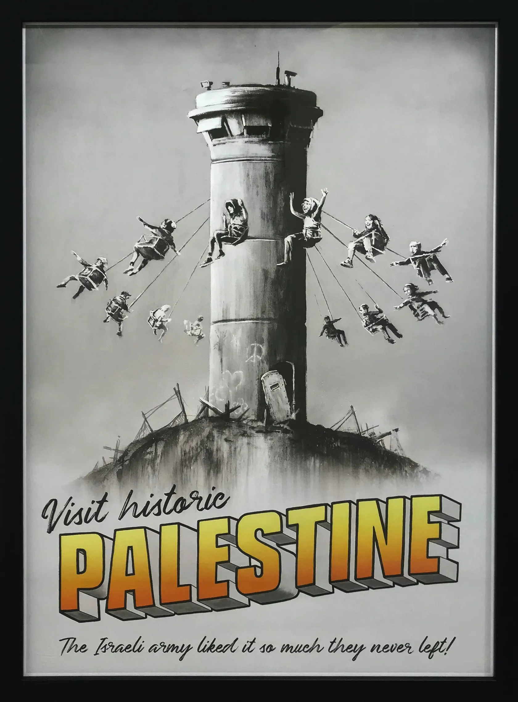 Children swinging from a watchtower with text promoting Palestine